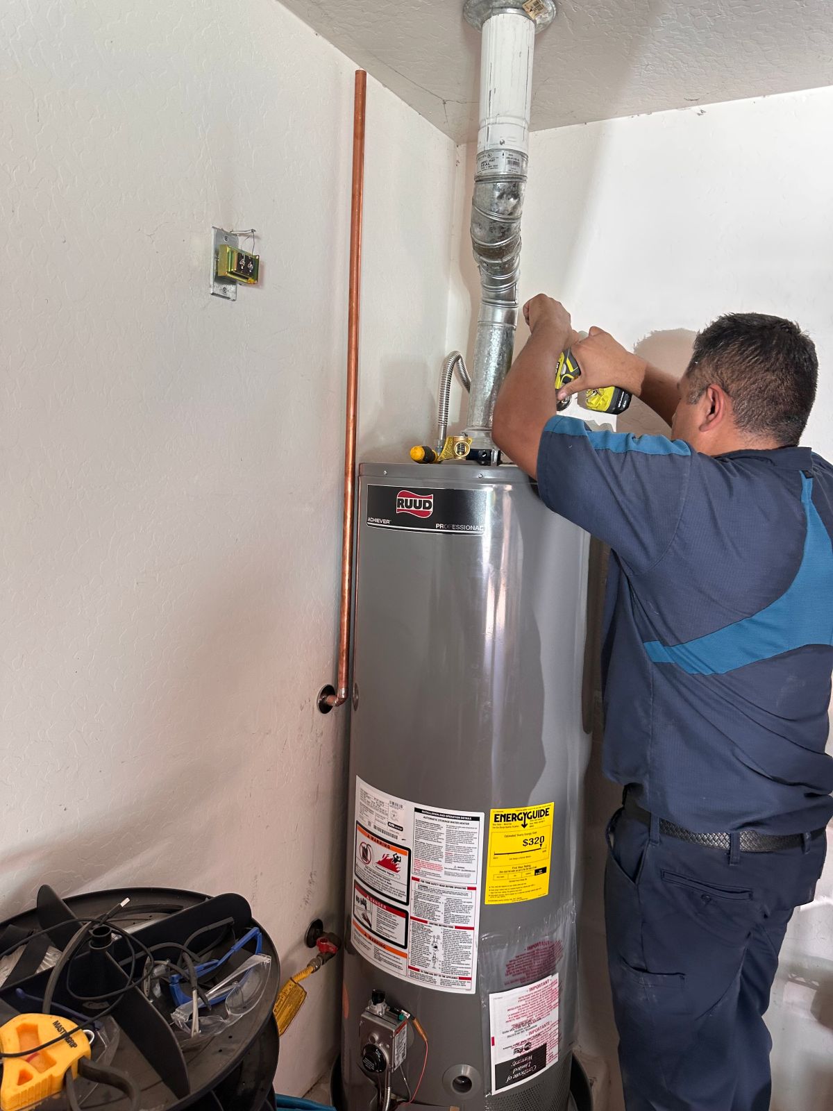 Rigo fixing water heater replacement